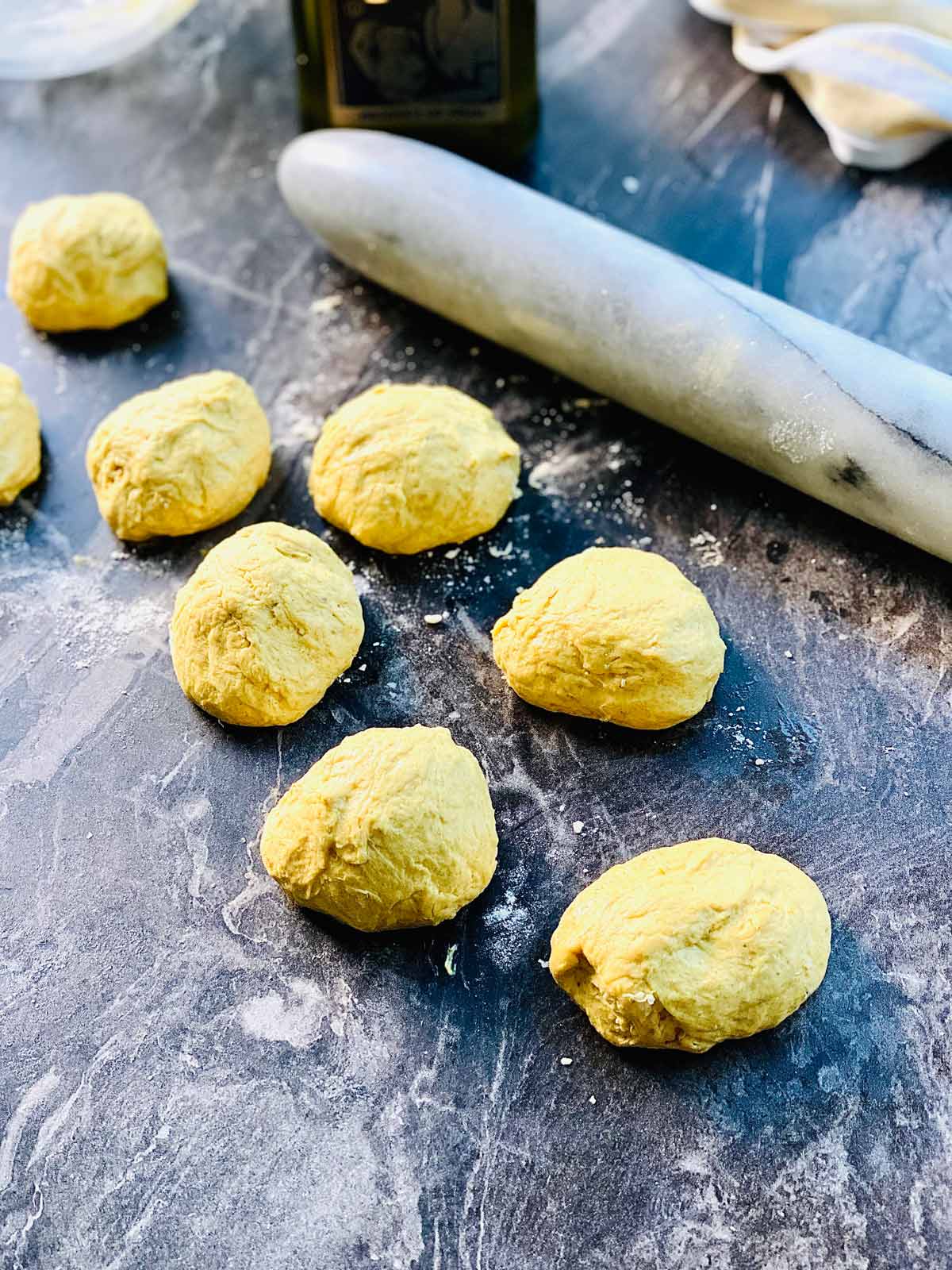 8 dough balls ready for making the parathas