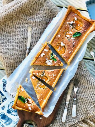 Almond flour cake with apricots, coconut and mint