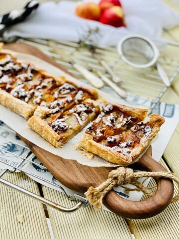 Apple and orange marmalade tart with rosemary and chia seeds