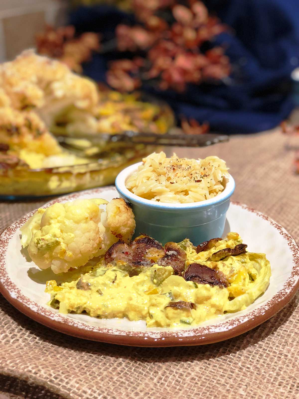 Creamy cauliflower with pork medallions turmeric and mushrooms 