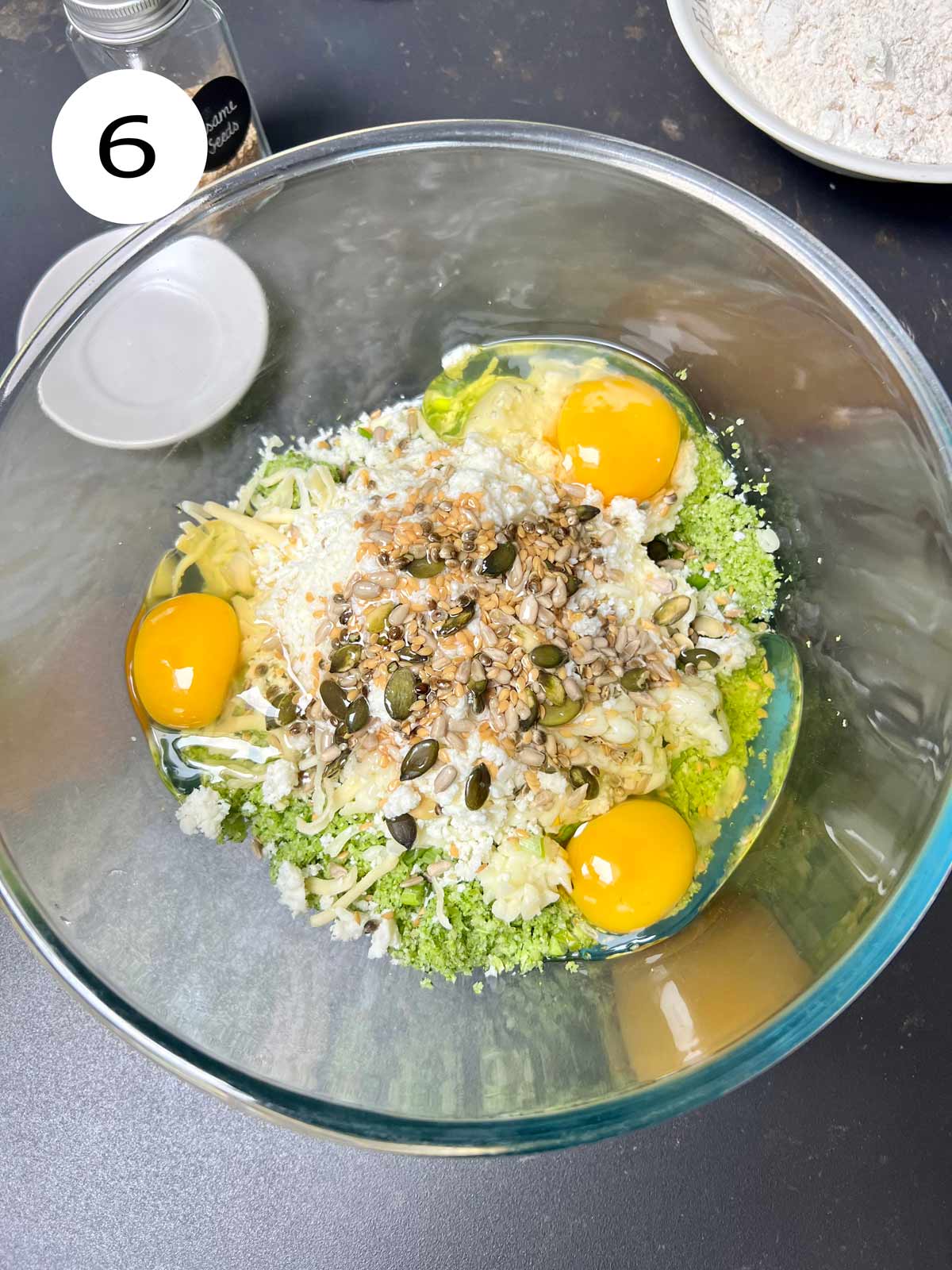 Added the eggs and the mixed seeds to the broccoli bread mixture.