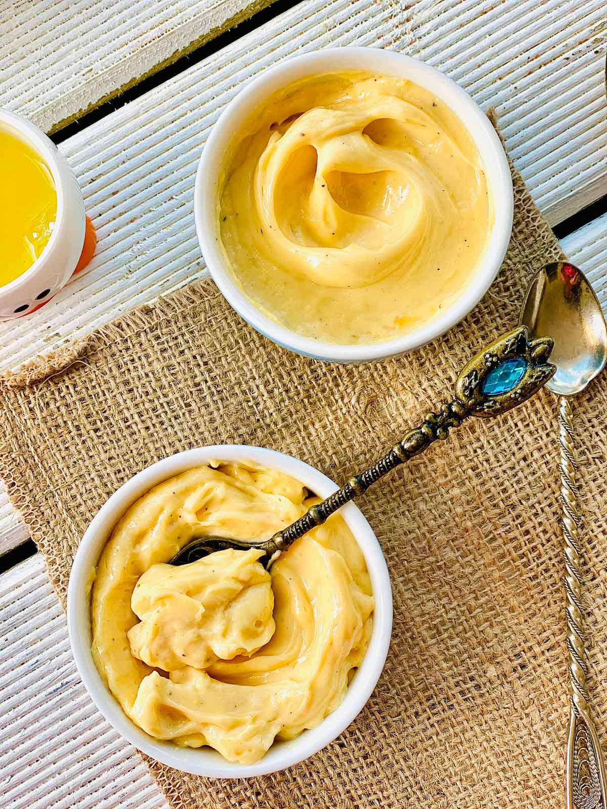 homemade mayonnaise in two bowls