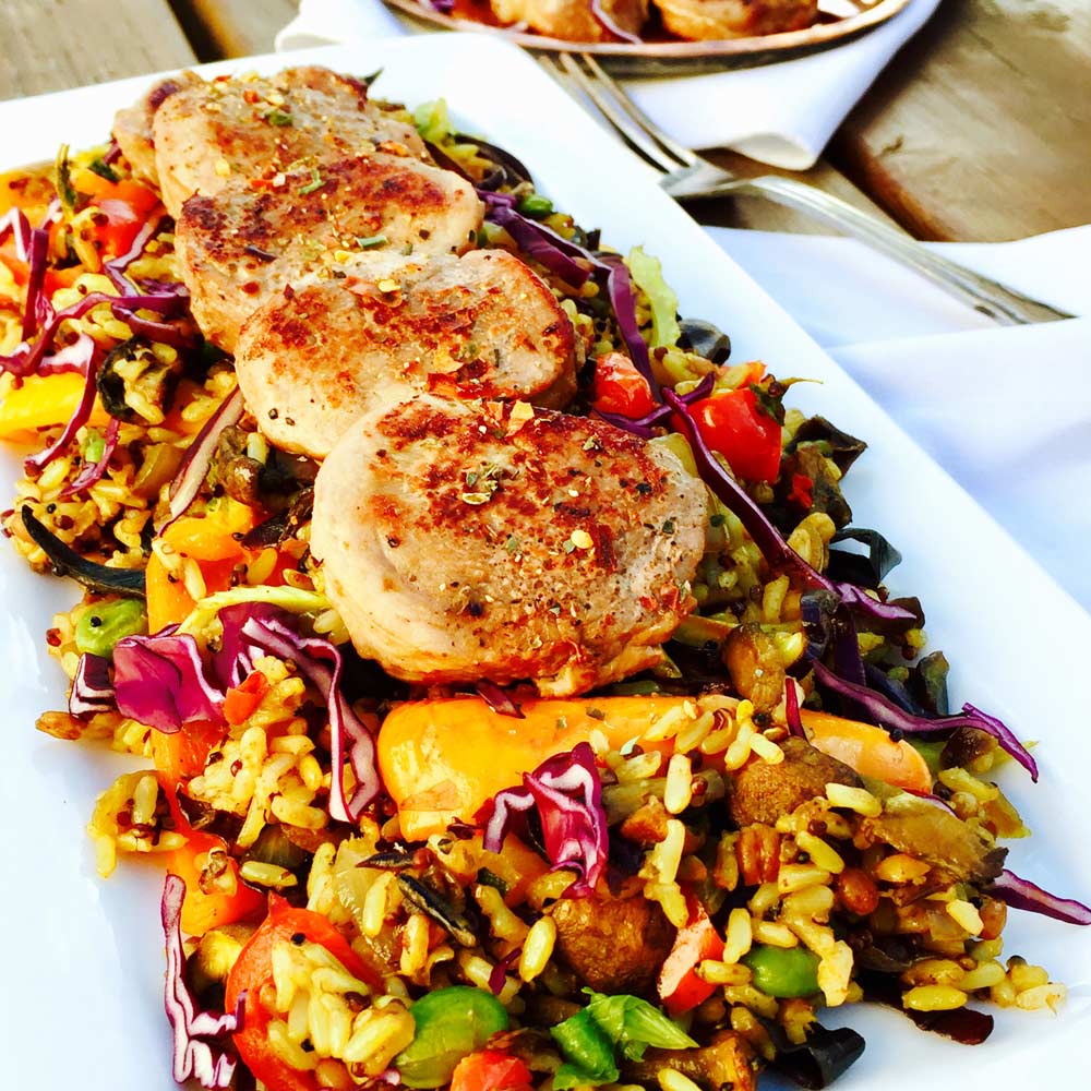 Pork medallions with seasonal vegetables