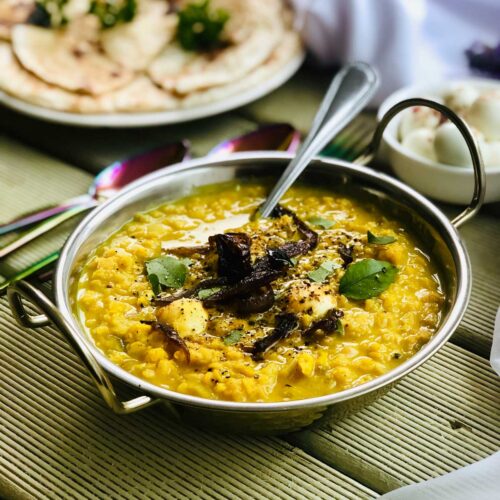 Red lentil dhal with coconut milk caramelized onions and quail eggs