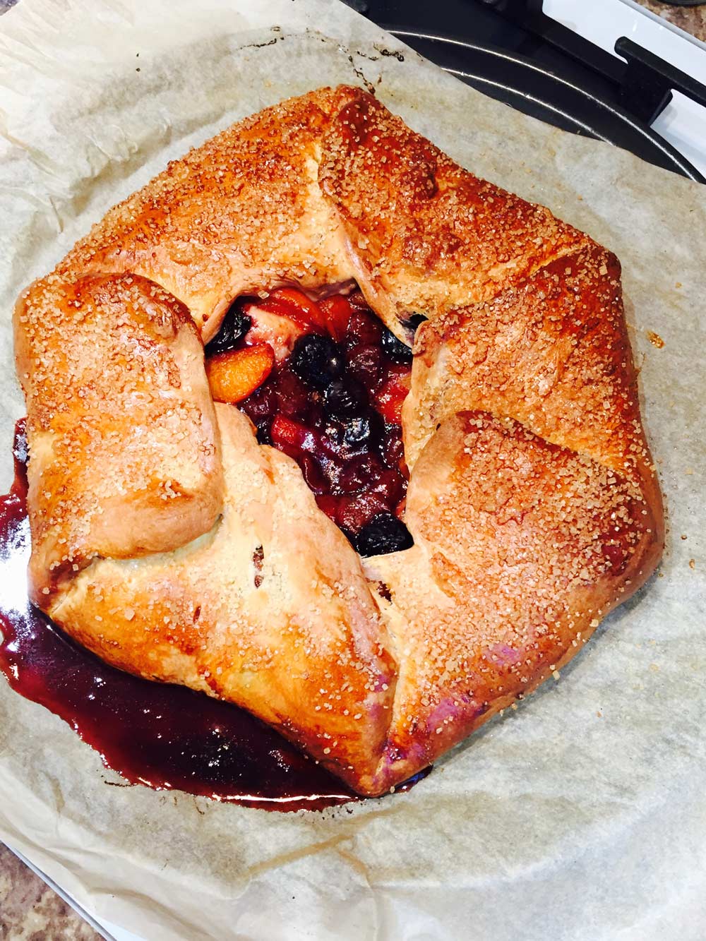 Spelt flour, coconut, quince jam and peach homemade galette image