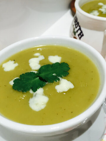 Broccoli and stilton cheese soup, in a white bowl