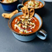 Cherry tomato soup, with croutons and a few drizzle of cream.