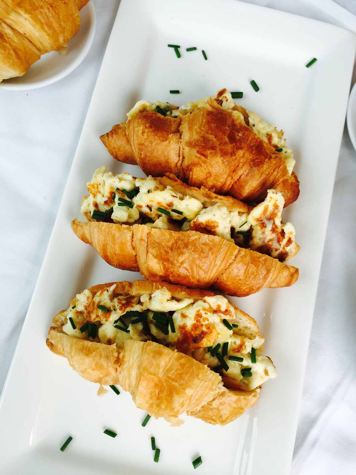 This morning croissant and scrambled eggs treat is a tasty and truly delightful way to start your day!