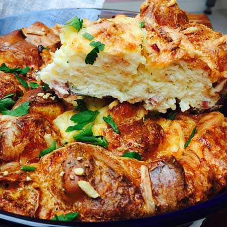 Crust-in quiche slice, with parsley