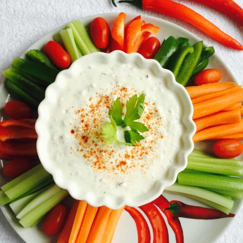 Cucumber, fennel and yoghurt dip, in a white bowl