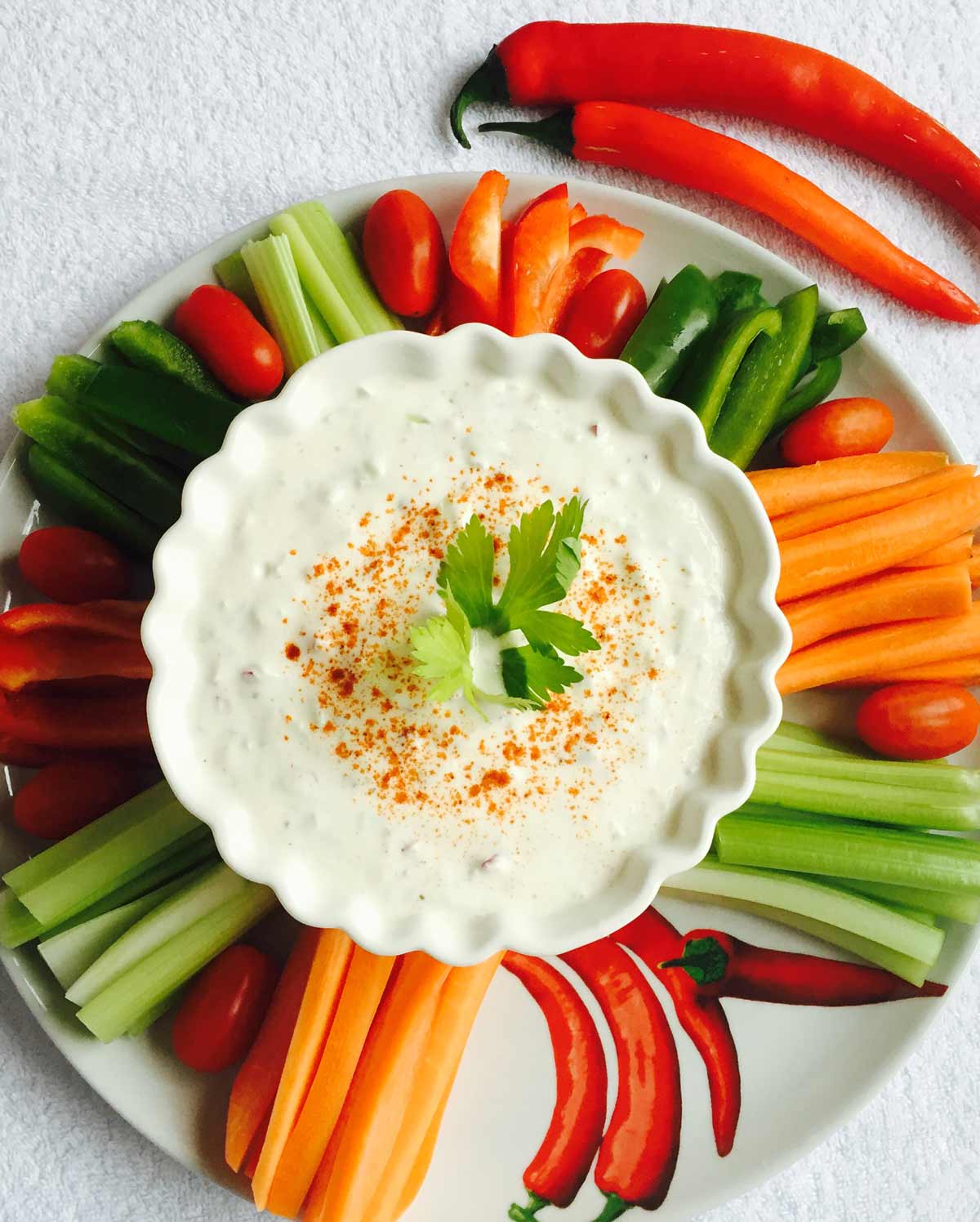 Cucumber, fennel and yoghurt dip, in a white bowl