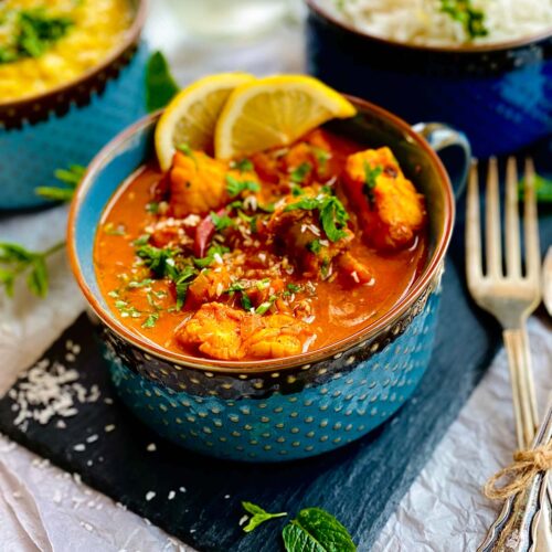 Monkfish curry in a turquoise bowl