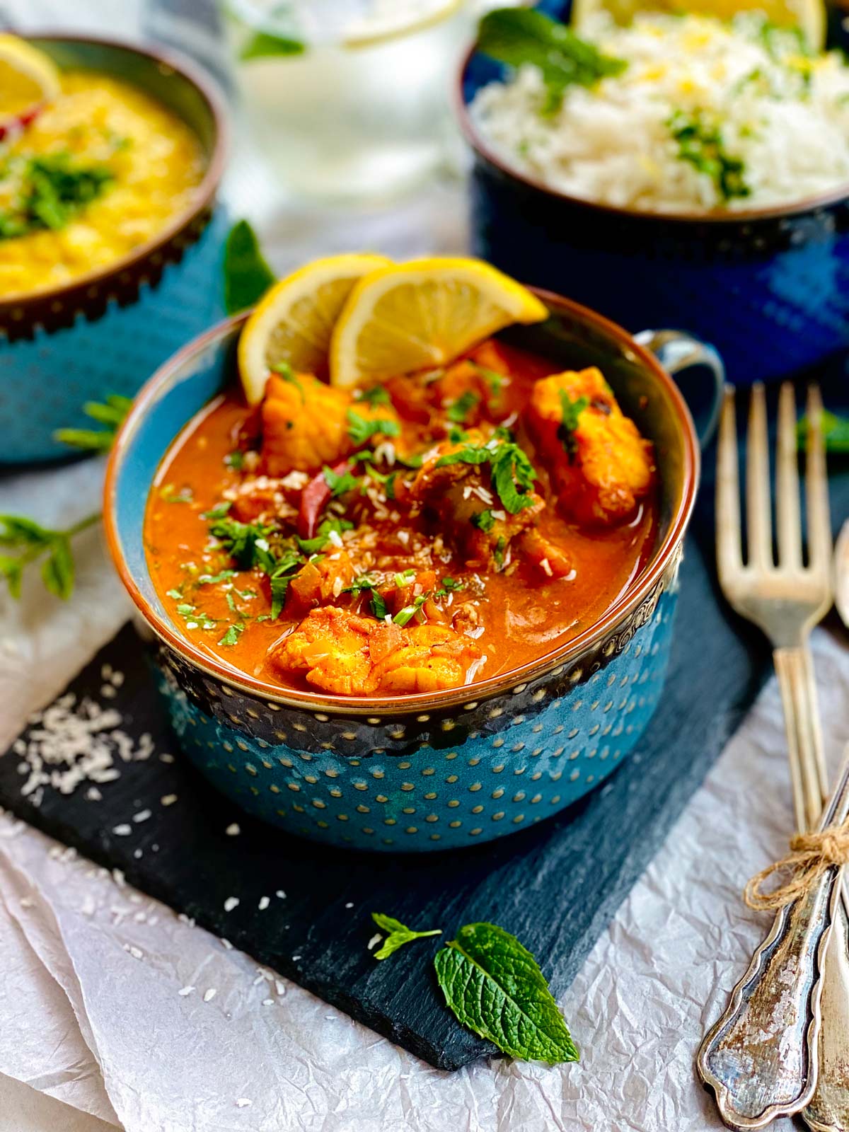 Monkfish curry in a turquoise bowl