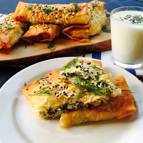 Feta and ricotta cheese with spinach and dill filo wraps