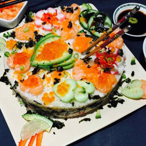 A delightful plate of homemade sushi cake.