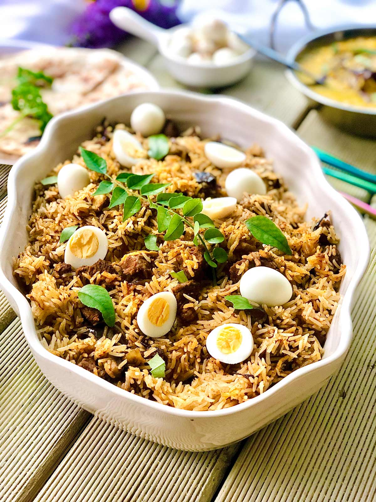 Lamb Biryani with Quail Eggs in a White Pot