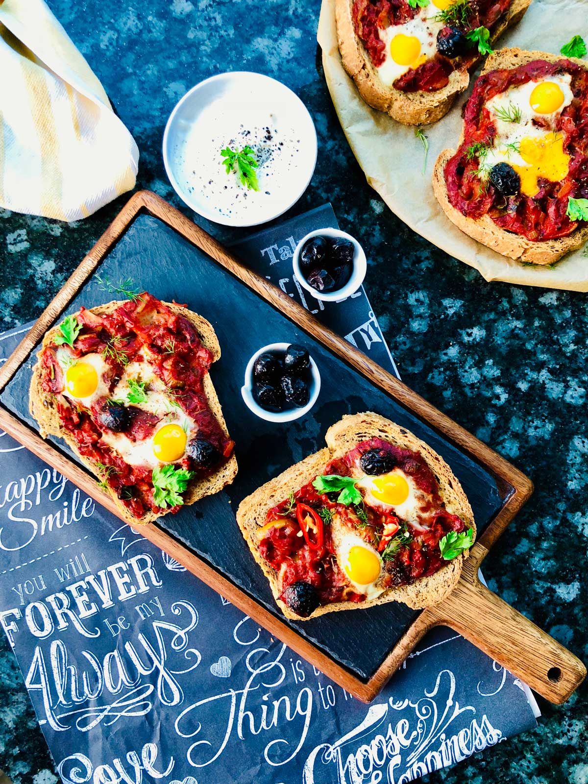 Pizza slices with quail eggs and tomato sauce