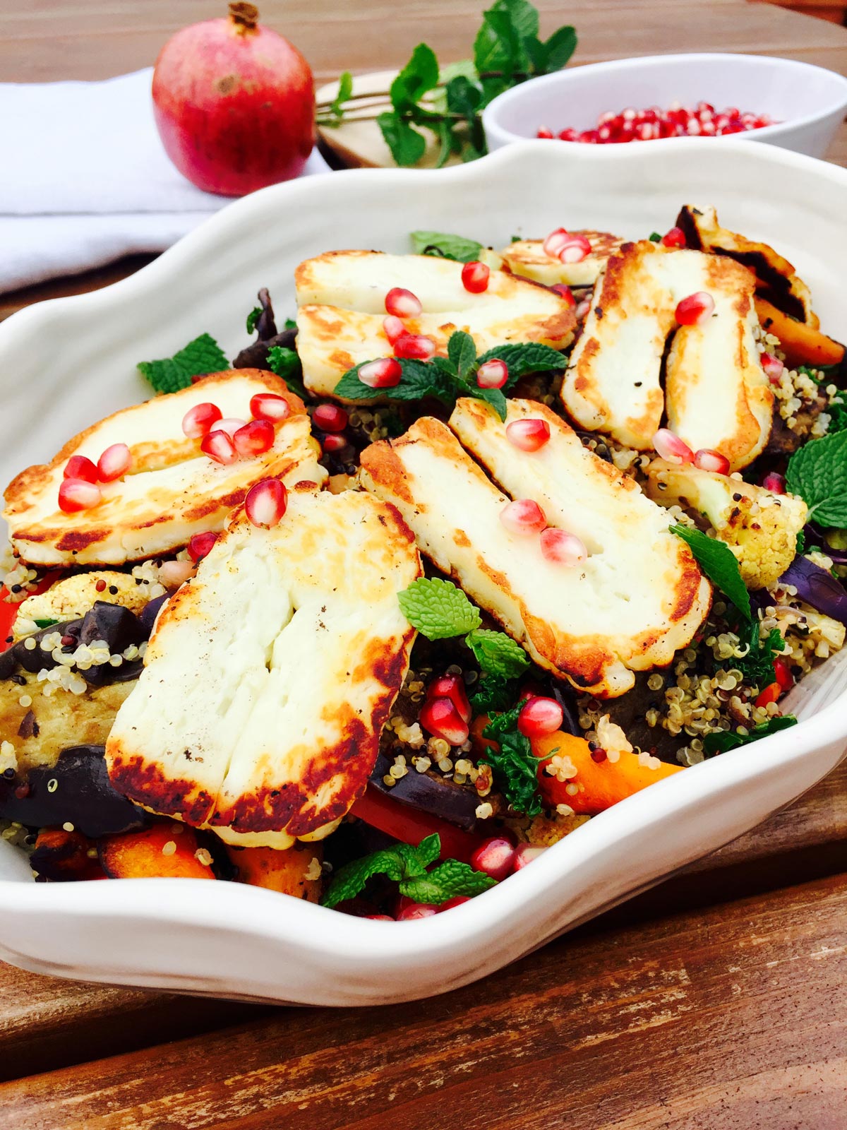 Quinoa, roast vegetables, halloumi cheese zaatar and pomegranate salad