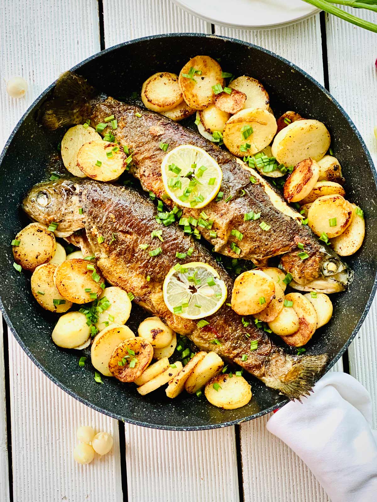 Delicious Rainbow Trout With Potatoes And Garlic