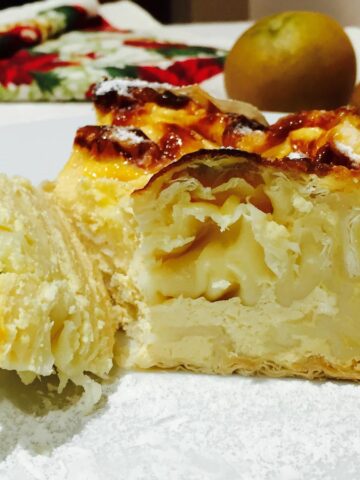 Turmeric feta cheese cake, on a white plate