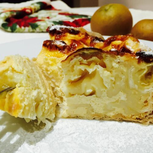 Turmeric feta cheese cake, on a white plate