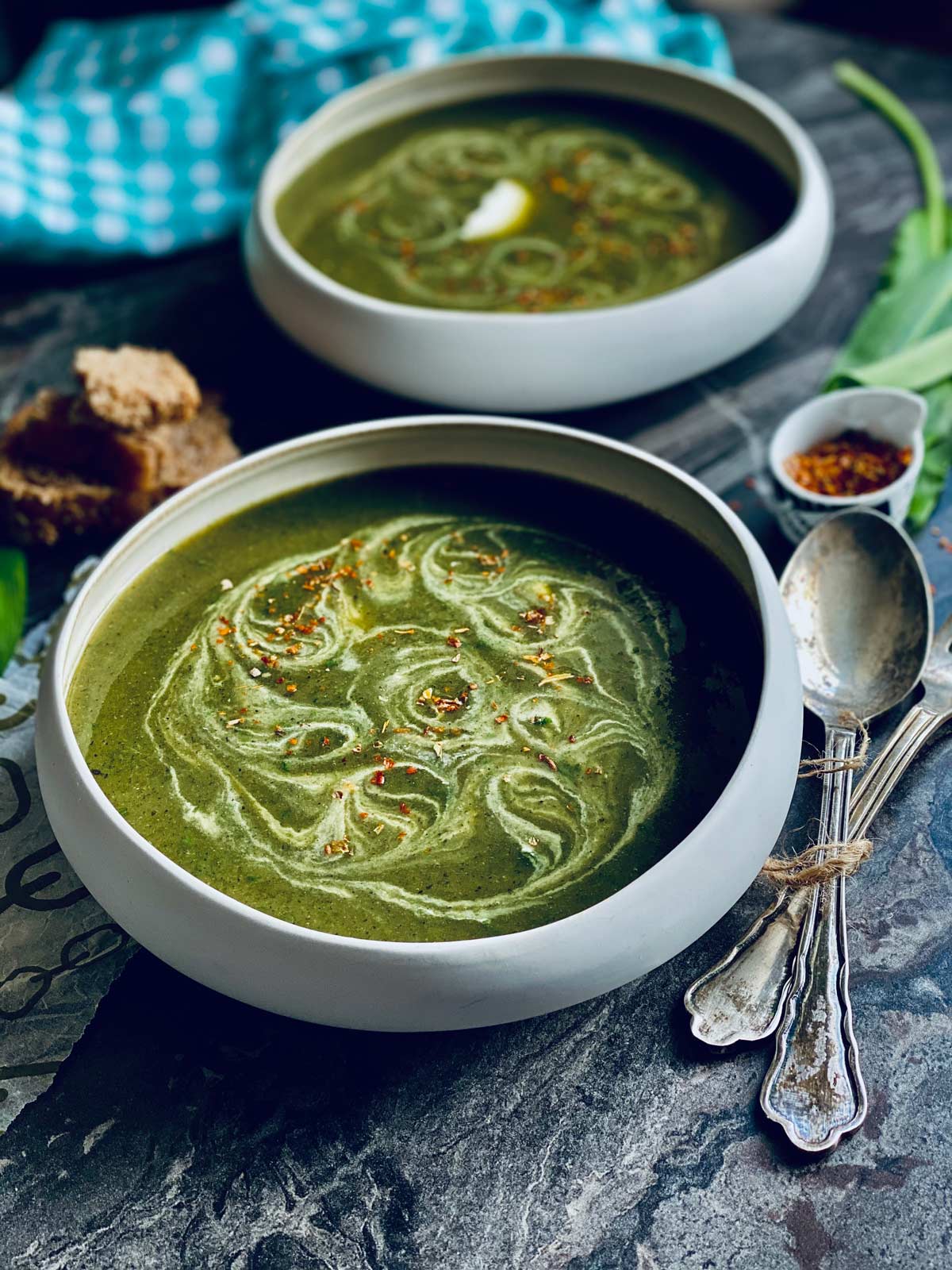 Two bowls of wild garlic and nettles soup