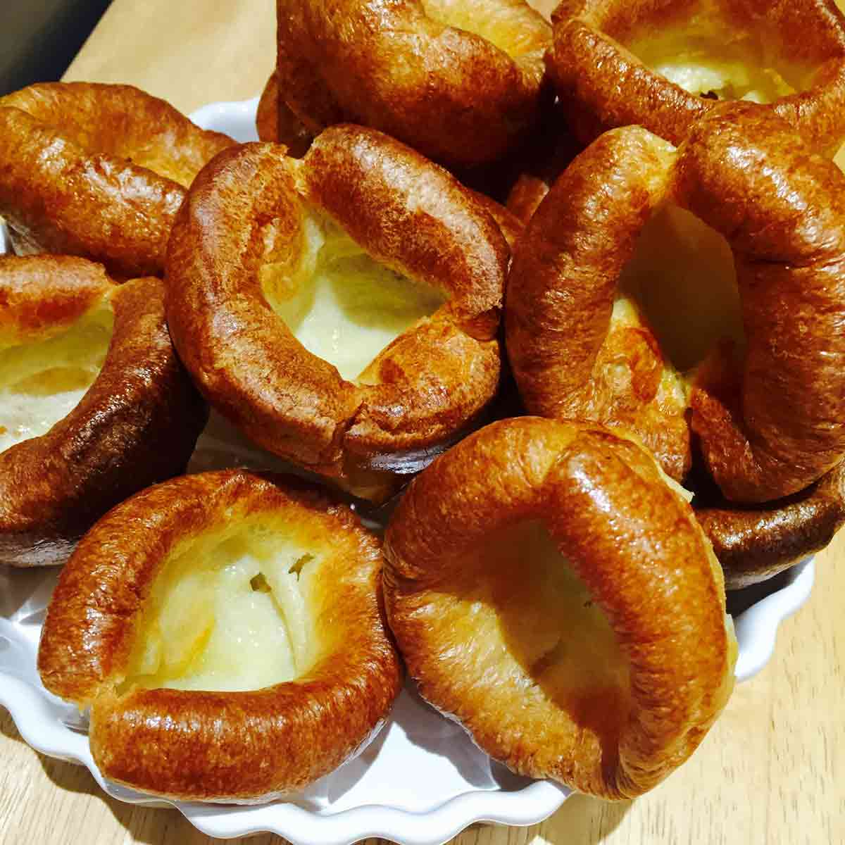 Yorkshire puddings on a white plate